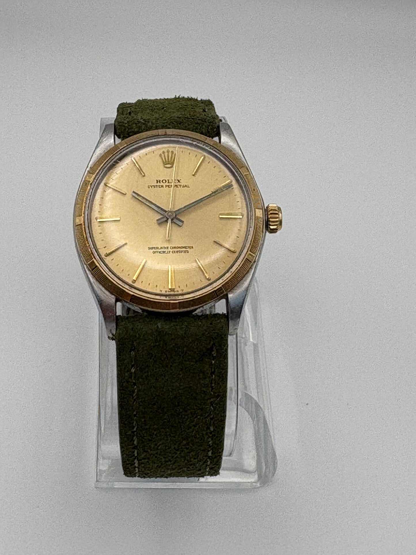 Two tone Rolex on a green strap